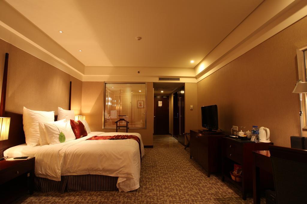 Ruiwan New Century Hotel Tchien-ťin Pokoj fotografie
